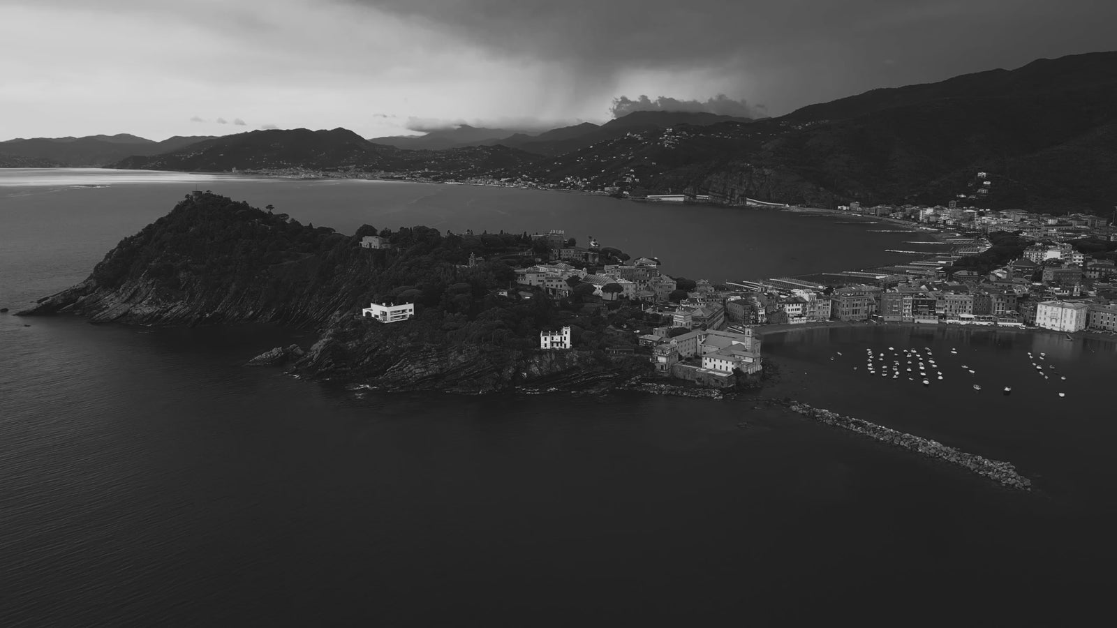 drone video of beautiful costal city in italy - slow motion